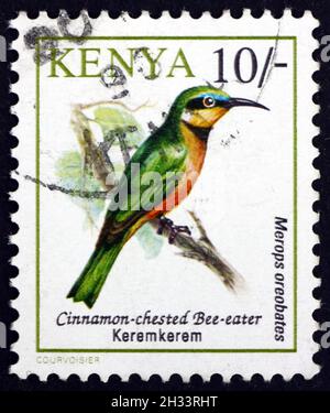 KENYA - CIRCA 1993: a stamp printed in Kenya shows Cinnamon-chested Bee-eater, Merops Oreobates, Bird, circa 1993 Stock Photo