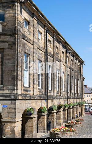 The Shambles in Alnwick an open-sided market building arcade of shops on Market street Alnwick Northumberland Northumbria England UK GB Europe Stock Photo