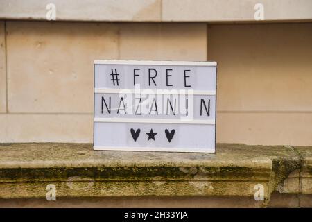 London, UK. 25th Oct, 2021. A 'Free Nazanin' sign is seen during Richard Ratcliffe's hunger strike in Whitehall.Richard Ratcliffe, the husband of British-Iranian aid worker Nazanin Zaghari-Ratcliffe, has begun a hunger strike outside the Foreign Office, calling on the UK government to do more to help with her release. Nazanin Zaghari-Ratcliffe has been detained in Iran since 2016 for allegedly spreading propaganda against the Iranian government. Credit: SOPA Images Limited/Alamy Live News Stock Photo