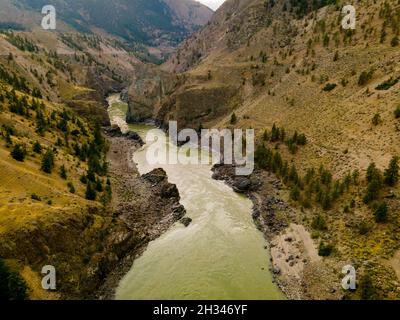 Fraser River looking downstream, just before the city of Lillooet in British Columbia, Canada. Stock Photo