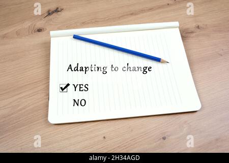 Adapting to change checklist on notepad page Stock Photo