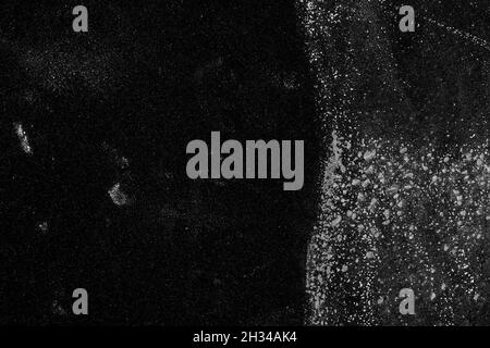 Black grunge abstract background. Rough splattered mottled surface. Copy space. Halloween backdrop Stock Photo