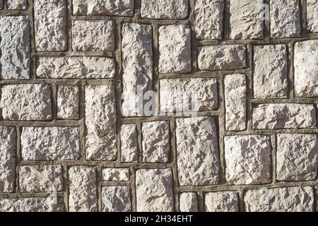 texture of gray stone wall made of concrete Stock Photo