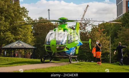 Great Western Air Ambulance Eurocopter EC135, callsign 'Helimed 65', in Bristol's Castle Park having attended a nearby incident. Stock Photo