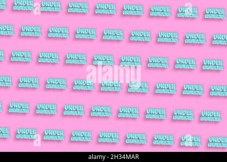 Under construction design, website development concept Under construction, pink minimal background Stock Photo
