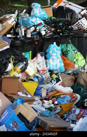 Huge piles of rubbish piled up next to bins in Brighton, East Sussex, UK, during the bin man strike when unions were fighting with the Green party. Stock Photo