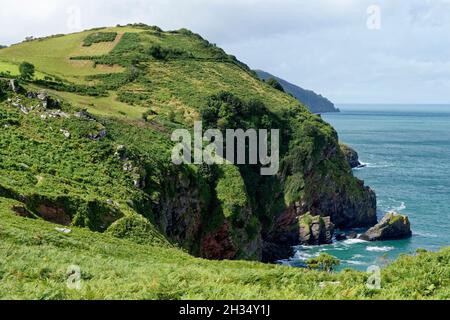 Wringcliff Bay & Duty Point, Valley Of The Rocks, Exmoor, Devon, UK  Highveer Point in the distance Stock Photo