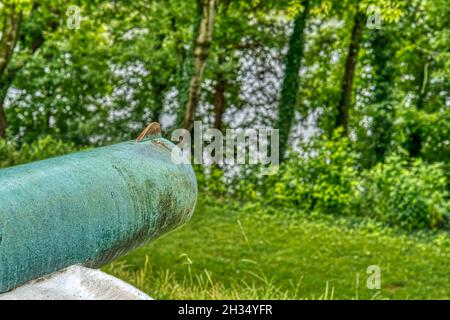 Cannon overlooks the Tennessee River inside the Shiloh National Cemetery located at the Shiloh National Military Park in Tennessee. Stock Photo