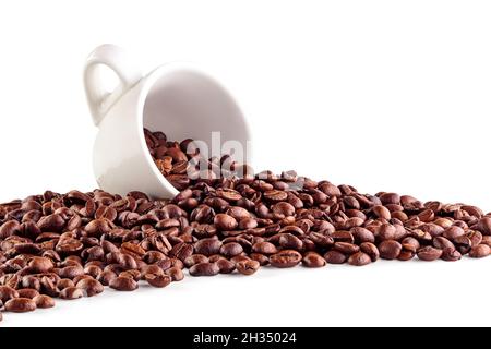 White cup with coffee beans Stock Photo