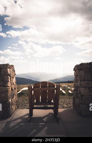 An empty rocking chair at the top of Vail Mountain in Colorado. Stock Photo