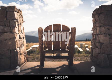 An empty rocking chair at the top of Vail Mountain in Colorado. Stock Photo