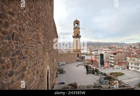 NIGDE, TURKEY - JANUARY 31: Nigde city center and watch tower from Nigde Castle on January 31, 2015 in Nigde, Turkey. Nigde at Central Anatolia in Turkey. Stock Photo
