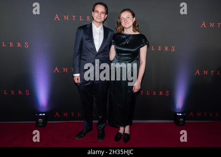 New York, USA. 25th Oct, 2021. Henry Chaisson and guest attend the special screening of “Antlers” at the Regal Essex Crossing & RPX in New York, New York on October 25, 2021. (Photo by Gabriele Holtermann/Sipa USA) Credit: Sipa USA/Alamy Live News Stock Photo