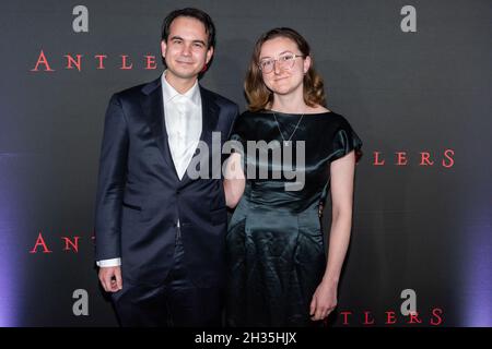 New York, USA. 25th Oct, 2021. Henry Chaisson and guest attend the special screening of “Antlers” at the Regal Essex Crossing & RPX in New York, New York on October 25, 2021. (Photo by Gabriele Holtermann/Sipa USA) Credit: Sipa USA/Alamy Live News Stock Photo