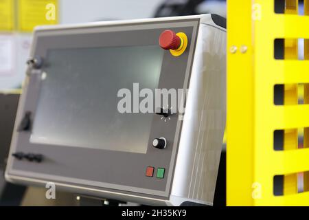 Modern industrial remote touchscreen control panel. Selective focus. Stock Photo