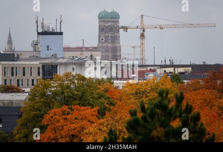 Munich, Germany. 22nd Oct, 2021. The towers of the Frauenkirche can be seen in the centre of the city. Credit: Daniel Josling/dpa/Alamy Live News Stock Photo