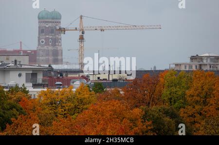 Munich, Germany. 22nd Oct, 2021. The towers of the Frauenkirche can be seen in the centre of the city. Credit: Daniel Josling/dpa/Alamy Live News Stock Photo