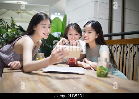 Three best friends getting together Stock Photo