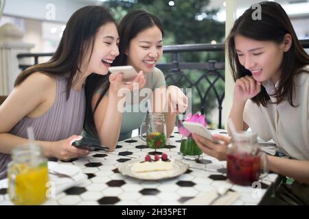 Three best friends getting together Stock Photo