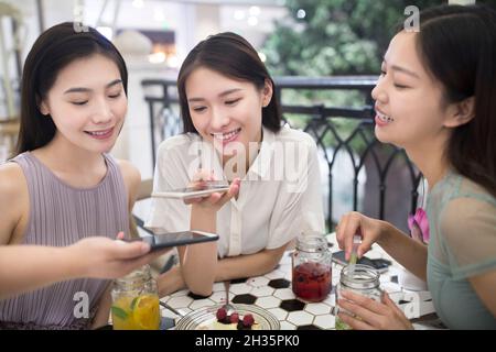 Three best friends getting together Stock Photo