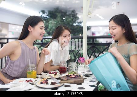 Three best friends getting together Stock Photo