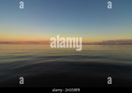 Lavnun Beach - Kursi in the eastern part of the Sea of Galilee in northern Israel, early morning - summer Stock Photo