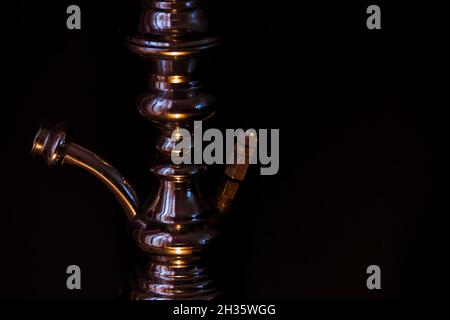 Hookah shaft close-up on a black background.  Stock Photo