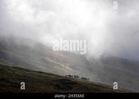 Dramatic light on the A4086 between Capel Curig and Pen-Y-Pass in Snowdonia National Park, Wales UK Stock Photo