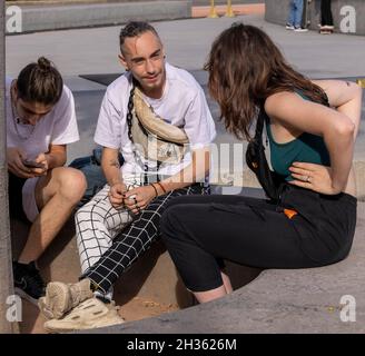 youths talking at Plainpalais skatepark, Geneva, Switzerland Stock Photo