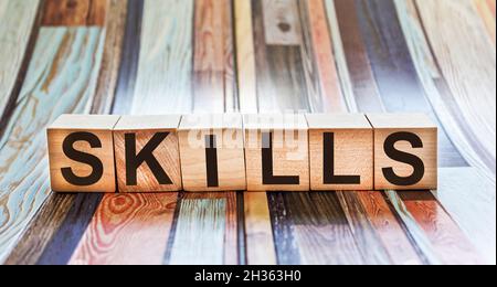 Wooden blocks with text Skills on colorful background Stock Photo