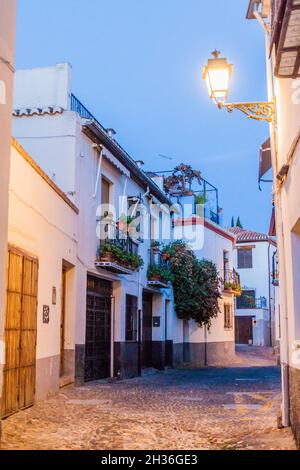 Evening in the streets of Albaycin neighborhood of Granada, Spain Stock Photo