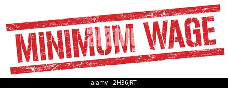 MINIMUM WAGE text on red grungy rectangle stamp sign. Stock Photo