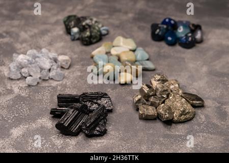 Semi precious gem stones collection. Different shapes sea rock pebbles Stock Photo
