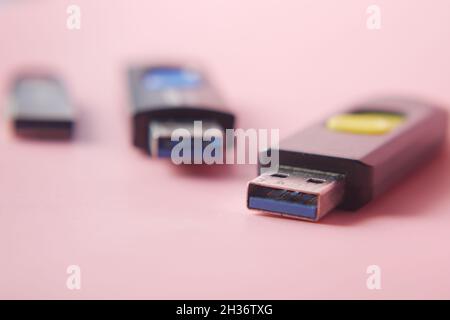 USB flash drive on blue background close up  Stock Photo