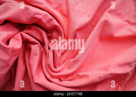 Rose gold fabric cloth texture for background and design art work, beautiful crumpled pattern of pink cotton Stock Photo