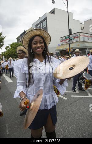 Panamanian Parade on Franklin Avenue in Brooklyn, NY, the largest Panamanian Parade anywhere outside of Panama. It commemorates Panama's breakaway from Columbia and honors its cultural heritage. International Drums and Brass group perform in the parade. Stock Photo