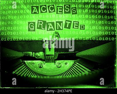 Access Granted displayed on a vintage typewriter in a green tone Stock Photo
