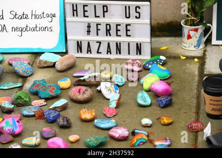 London, UK. 26th Oct, 2021. London, UK, October 26th. Painted pebbles with messages of support for detained Nazanin Zaghari-Ratcliffe. Credit: Uwe Deffner/Alamy Live News Stock Photo