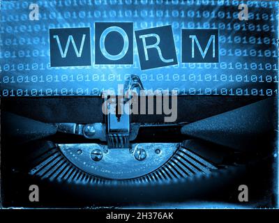Worm, Mechanical Typewriter, Binary code background, Blue tone, Vintage distorted look, Ransom note typography Stock Photo