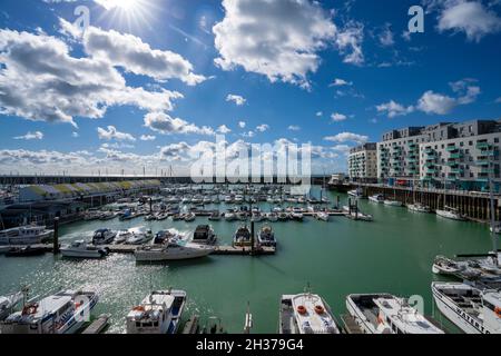 Apartments and moored yachts at Brighton Marina, Brighton, East Sussex, England, Uk Stock Photo