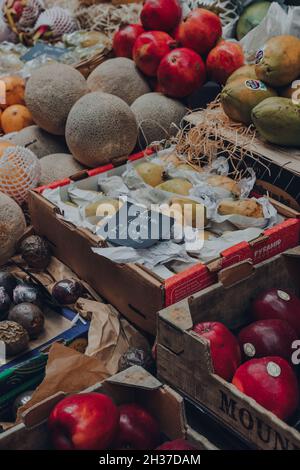 London, UK - October 17, 2021: Variety of fruits on sale at Turnips stand inside Borough Market, one of the largest and oldest food markets in London. Stock Photo