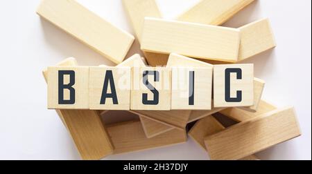 Wooden cubes with the word BASIC on a white background Stock Photo