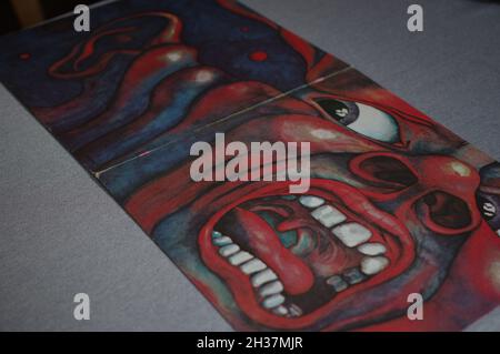 King Crimson 1969 debut album In the Court of the Crimson King vinyl LP paper sleeve cover 21st Century Schizoid Man face Stock Photo