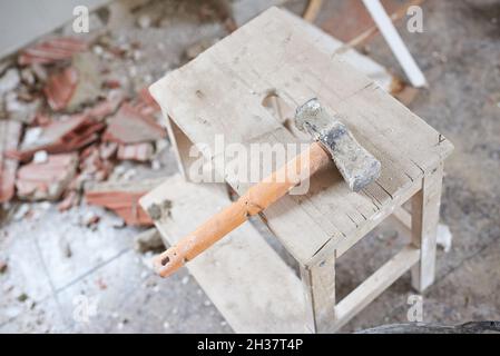 Construction hammer in a house under construction Stock Photo