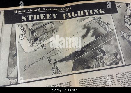 Street fighting tactics inside 'Modern World The Pictorial Review ' (replica) from Oct 1940, part of a WWII Home Guard memorabilia pack for schools. Stock Photo