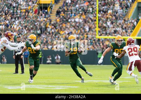 October 24, 2021: Green Bay Packers quarterback Aaron Rodgers #12 warms up  before the NFL football game between the Washington Football Team and the  Green Bay Packers at Lambeau Field in Green