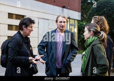 London, England, UK. 26th Oct, 2021. Highbury Corner Magistrates Court, London, UK, 26th October 2021. Tree Protectors Maria Gallastegui (62), Sebastian Roblin (20), Stefan Wright (28), Wictoria Zieke (26) out of Court at the end of the first day of trial. Despite last March's High Court ruling and the falling of every charge connected with the occupation of the tunnels under Euston Square on October 6, HS2 legal team amended the accusations only last Friday (22nd of October), and the tree protectors were still summoned to Court today.HS2 legal team considers the presence of th Stock Photo