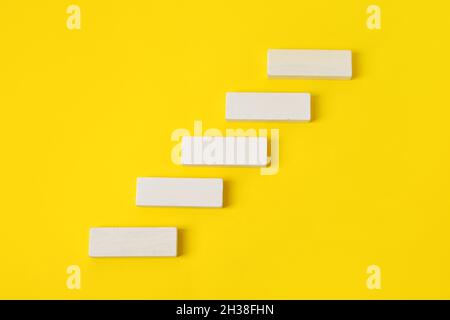 White blocks on yellow background Stock Photo