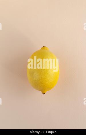 lemon on pink background, flat lay view Stock Photo