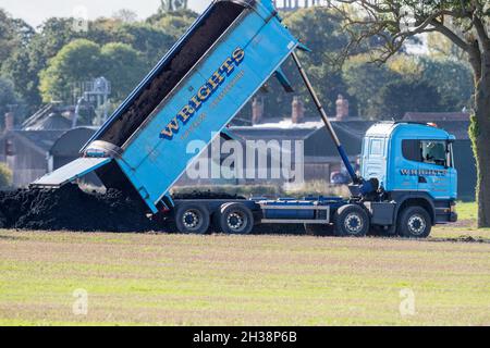 Wrights of Twycross operating a 8 wheeled tipper delivering waste to a farm. Stock Photo